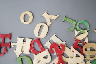 Boxed stained ivory letters, 19th century